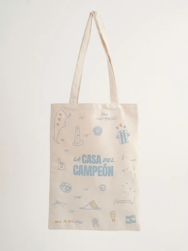 Tote bag natural con estampa completa e ilustraciones de La Casa del Campeón